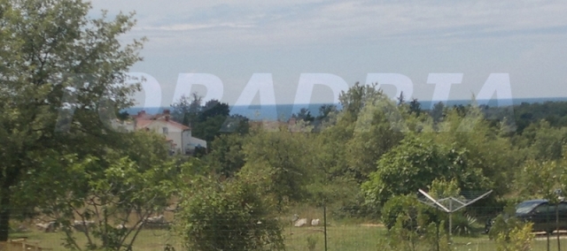 500 Meter vom Meer in Porec gelegenes Bauland mit Meerblick